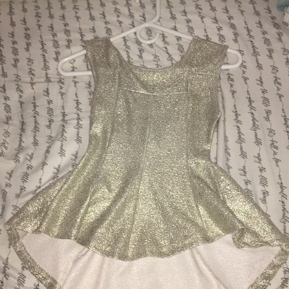 Tight fitting Gold shirt